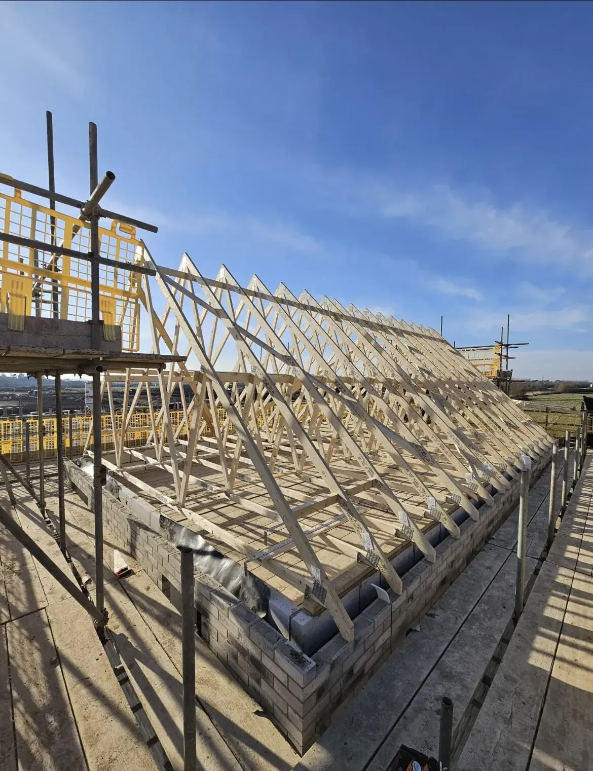Timber roof structure under construction by James Taylor Carpentry
